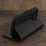 Integrated stand function of the Black with Red Detail Leather Wallet Case for iPhone 15 Pro