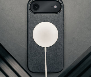 MagSafe charger attached to the Black Leather Bumper Case for iPhone 17 Air