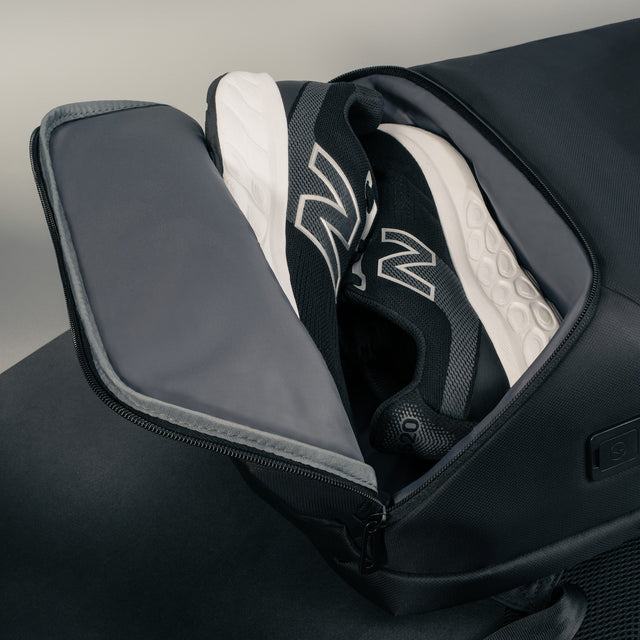 Dedicated shoe compartment in the Black Commuter Backpack