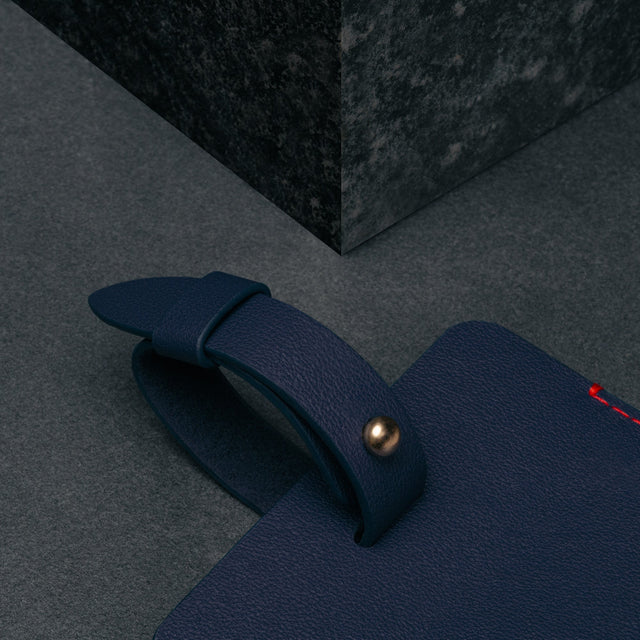Adjustable strap on the Navy Blue Leather Luggage Tag